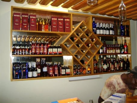 Bar (on property). Caribbean Hotel Cayes