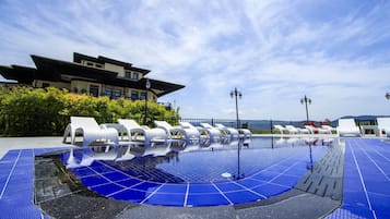 2 outdoor pools, open 9:00 AM to 8:00 PM, pool umbrellas, pool loungers