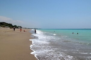 Private beach, white sand, sun-loungers, beach umbrellas