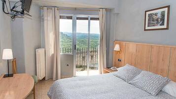 Double Room | Desk, blackout drapes, free cribs/infant beds, free WiFi