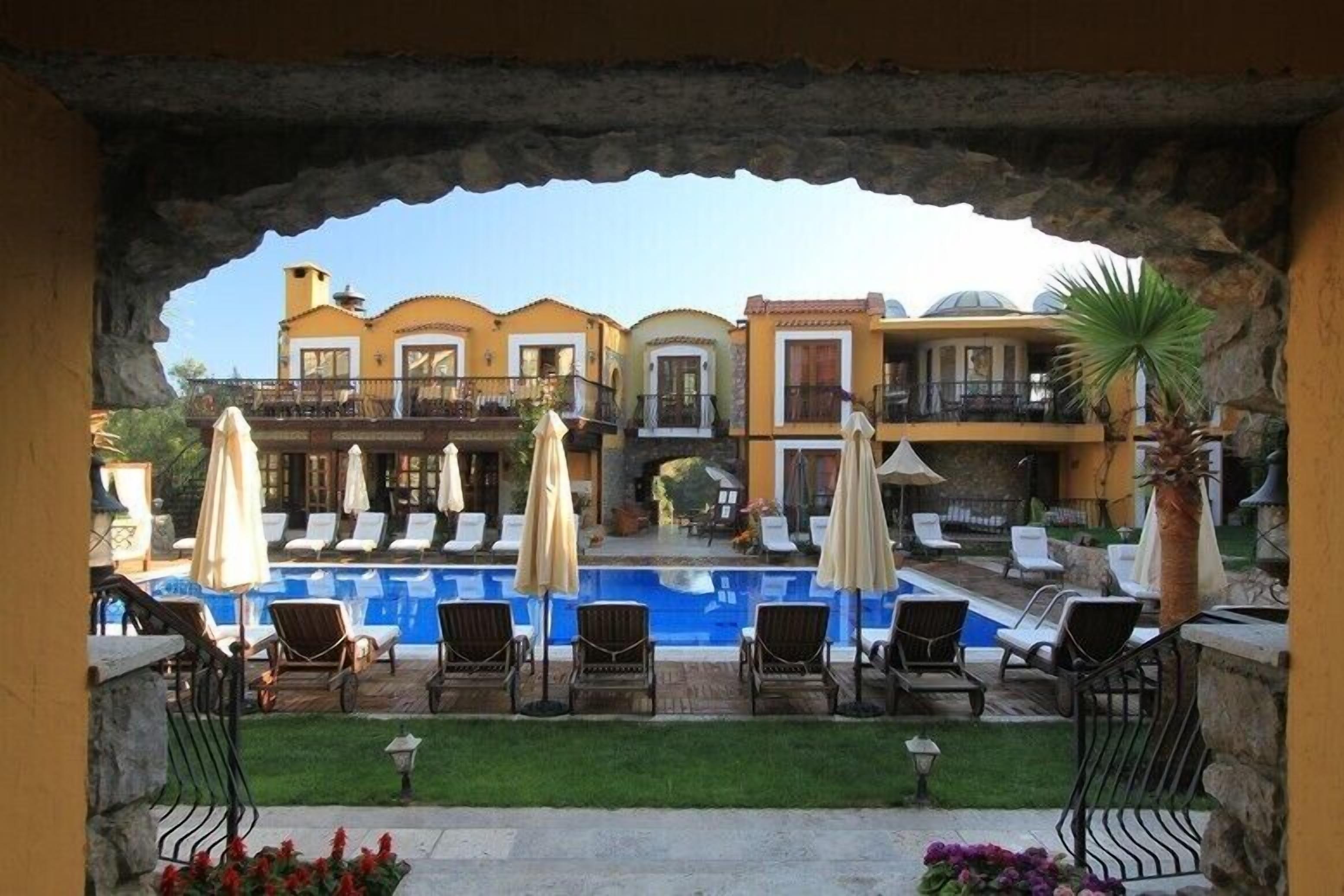 Outdoor pool, open 8:00 AM to 6:30 PM, pool umbrellas, sun loungers