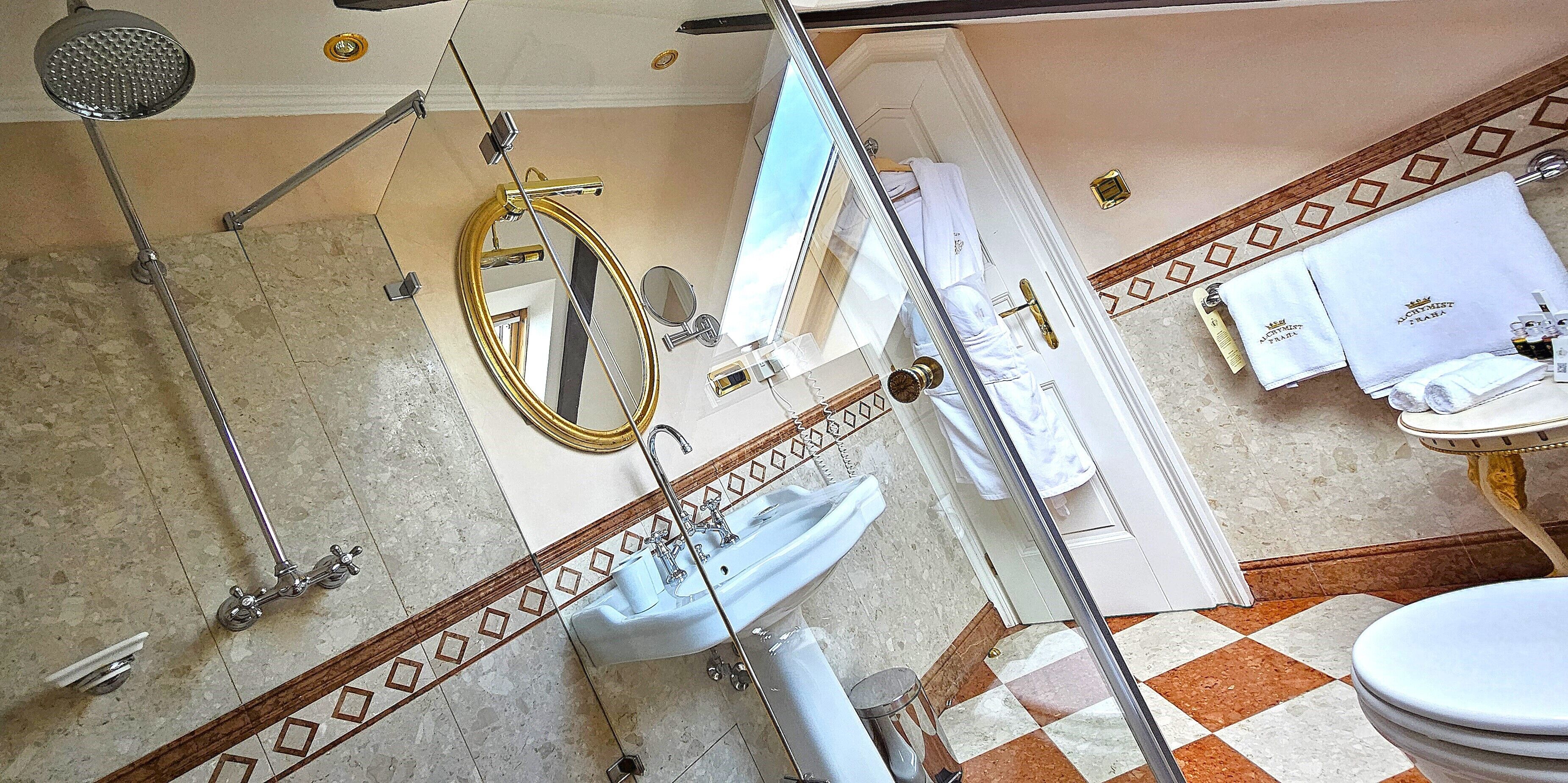 senior suite, 1 bedroom, tower | bathroom | combined shower/bathtub, free toiletries, hair dryer, slippers