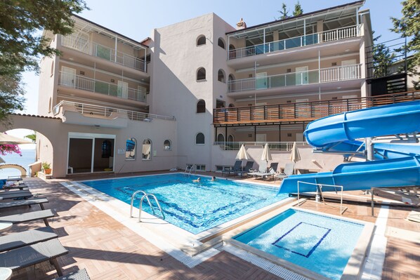 Outdoor pool, pool umbrellas, pool loungers