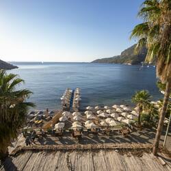 Private beach, free beach shuttle, free beach cabanas, sun-loungers