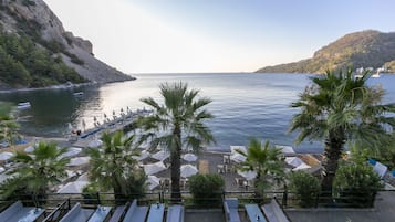 Private beach, free beach shuttle, free beach cabanas, sun-loungers