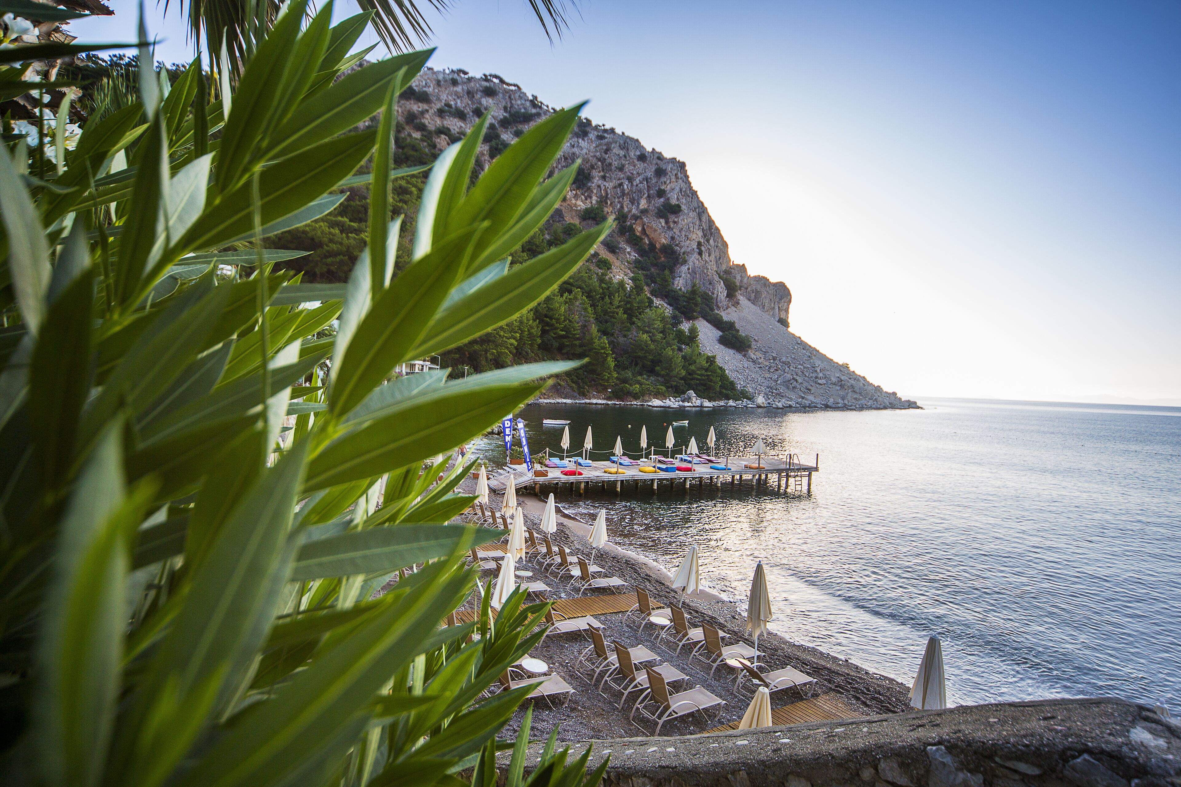 Private beach, free beach shuttle, free beach cabanas, sun loungers