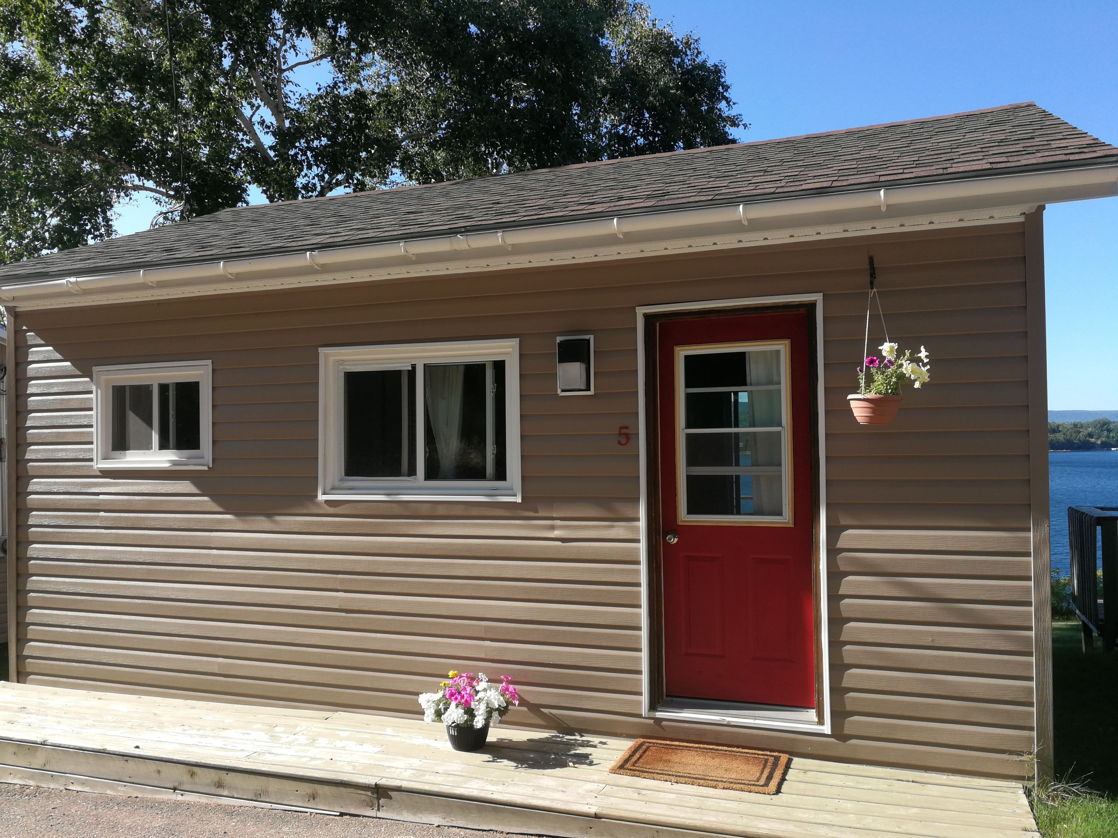 Cottage, 1 slaapkamer (#5) | Een kluis op de kamer, een bureau, gratis wifi, beddengoed