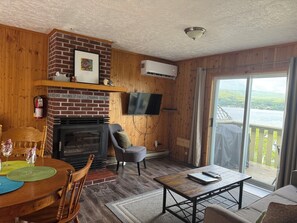 Suite, 2 Bedrooms (Duplex #9) | Living area | Flat-screen TV