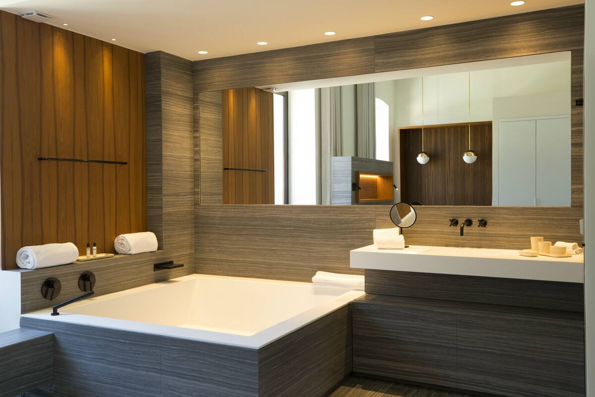 master suit port view | bathroom | free toiletries, hair dryer, towels