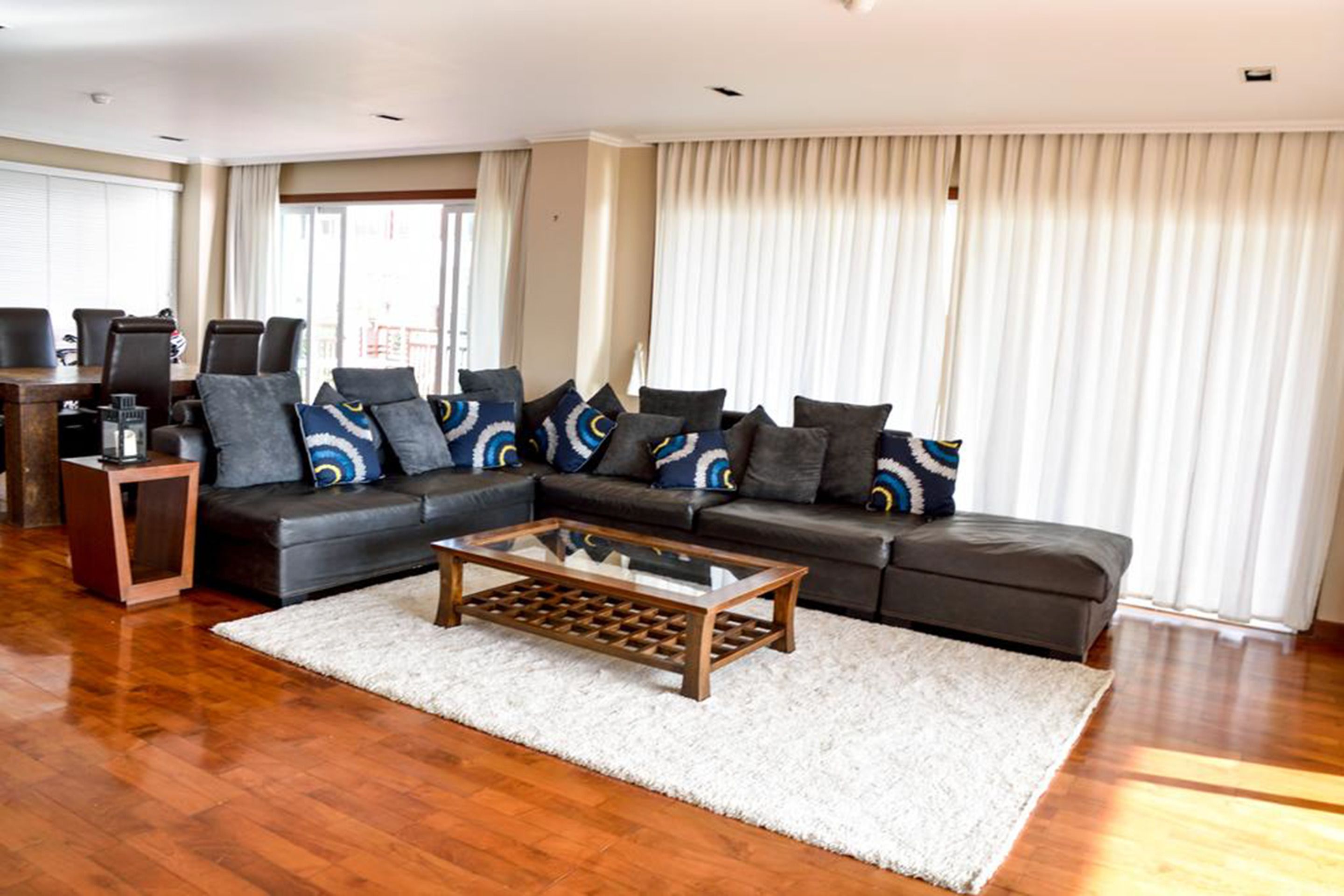 2-Bedroom Condo with Sea View | Living room | 52-inch flat-screen TV with digital channels, TV