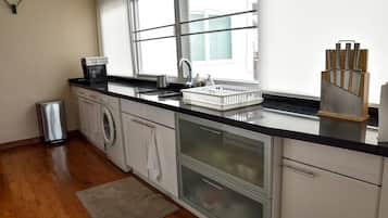 2-Bedroom Condo with Sea View | Private kitchen | Fridge, microwave, oven, stovetop