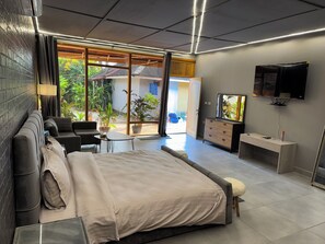 Deluxe Bungalow, 1 Bedroom, Kitchen, Garden View | Premium bedding, in-room safe, desk, laptop workspace - Tropicana Beach and Resort (Monrovia)