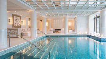 Indoor pool, outdoor pool, pool umbrellas, pool loungers