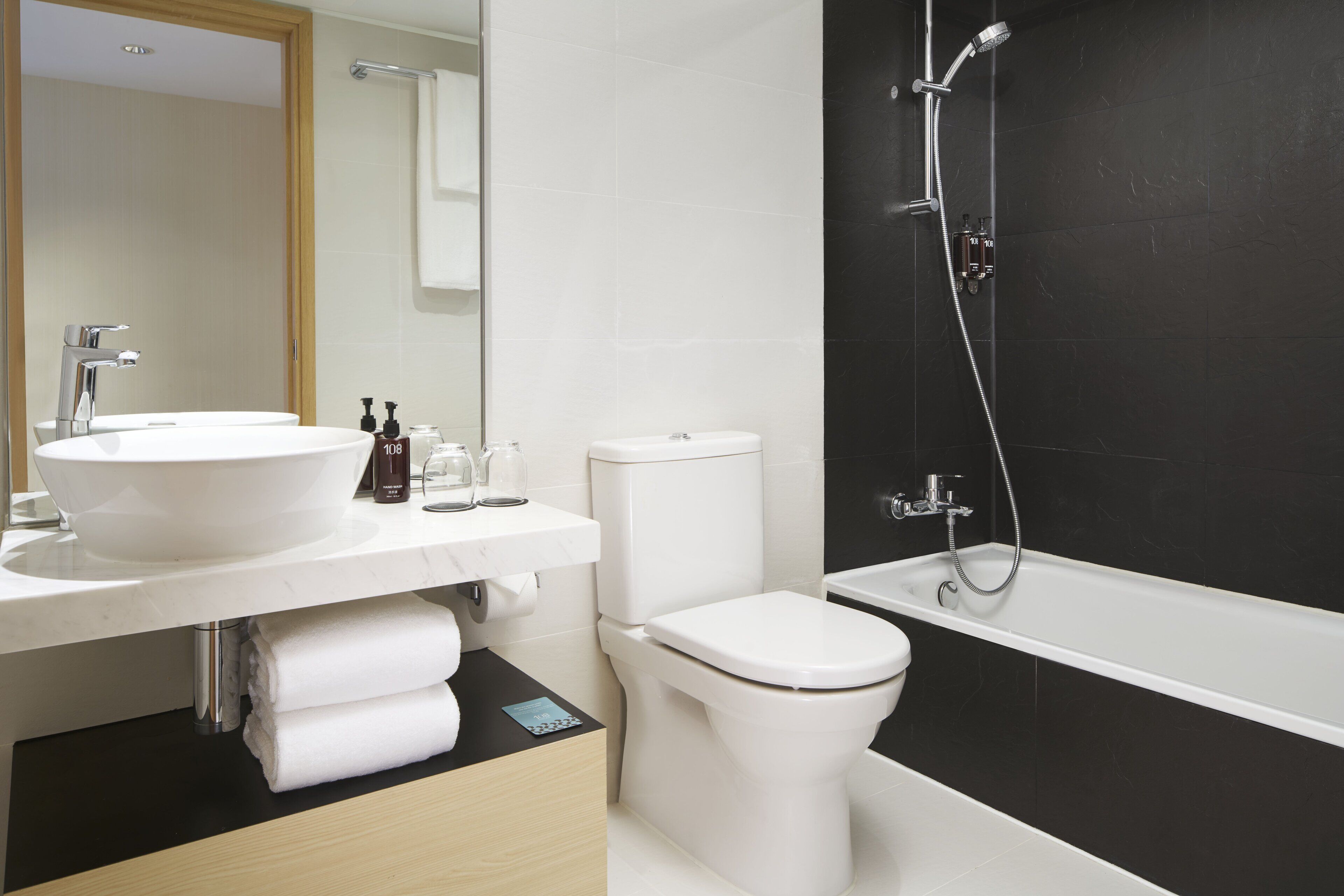 superior family room | minibar, in-room safe, desk, laptop workspace