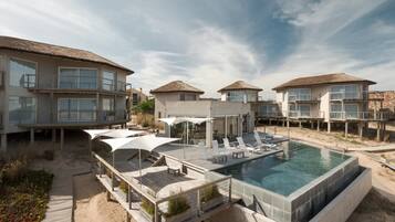 Outdoor pool, pool umbrellas, pool loungers