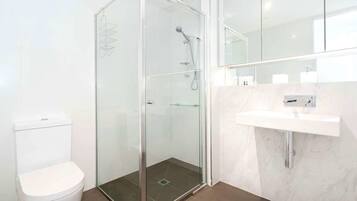 Apartment, 2 Bedrooms | Bathroom | Shower, free toiletries, hair dryer, towels