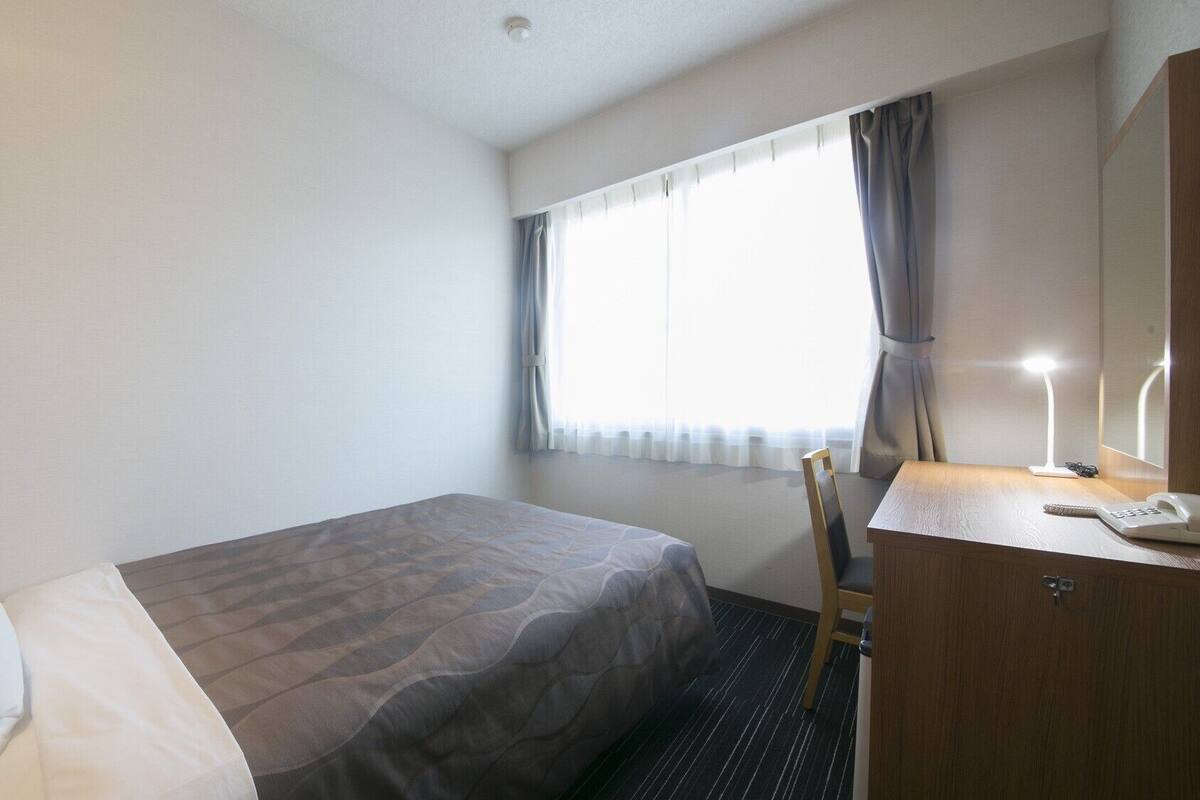 Desk, blackout drapes, iron/ironing board (on request)