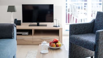 Televisio, DVD-soitin, kirjoja