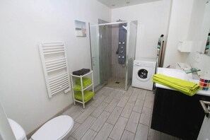 Shower, hair dryer, towels, soap
