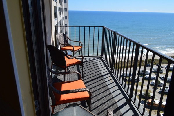 4 padded chairs & 2 sidetables to relax & enjoy the sounds & views of the ocean.