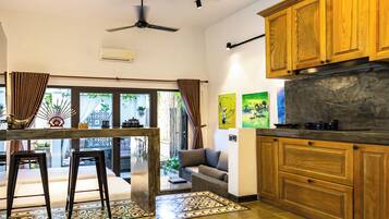 Full-size fridge, microwave, stovetop, electric kettle