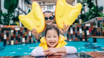 Outdoor pool, open 7 AM to 8 PM, pool umbrellas, pool loungers
