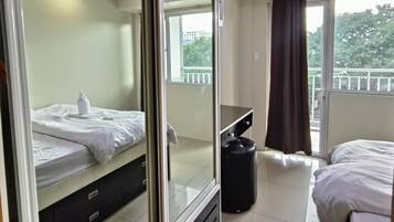 Comfort Condo | Premium bedding, memory-foam beds, minibar, desk