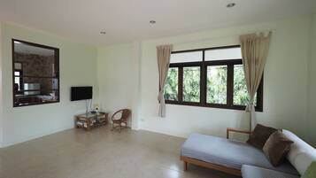 2-Bedroom House | Living room | 32-inch flat-screen TV with cable channels, TV