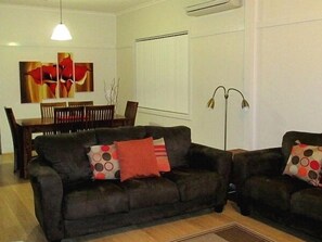 Cottage, 2 Bedrooms | Living area | LCD TV, DVD player - Interlude at Belmont (Belmont)