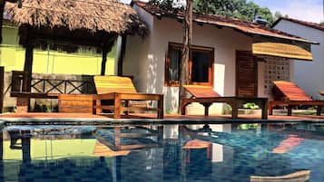 Outdoor pool, pool umbrellas, sun loungers