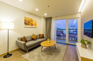 Chambre Premium avec lits jumeaux, 1 chambre, vue fleuve | Coin séjour