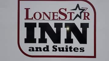 Logotipo para LoneStar Inn and Suites.