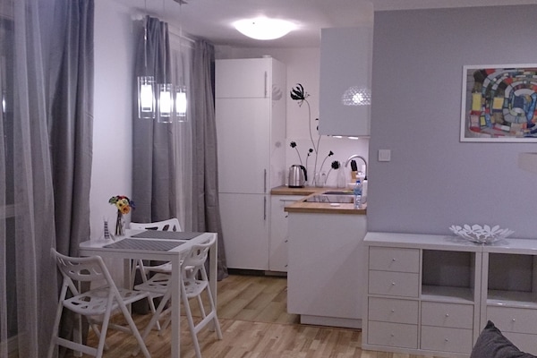 Fridge, stovetop, dishwasher, coffee/tea maker