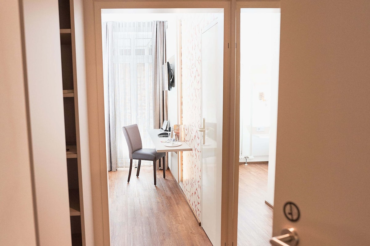 Classic Single Room | Living area | Flat-screen TV