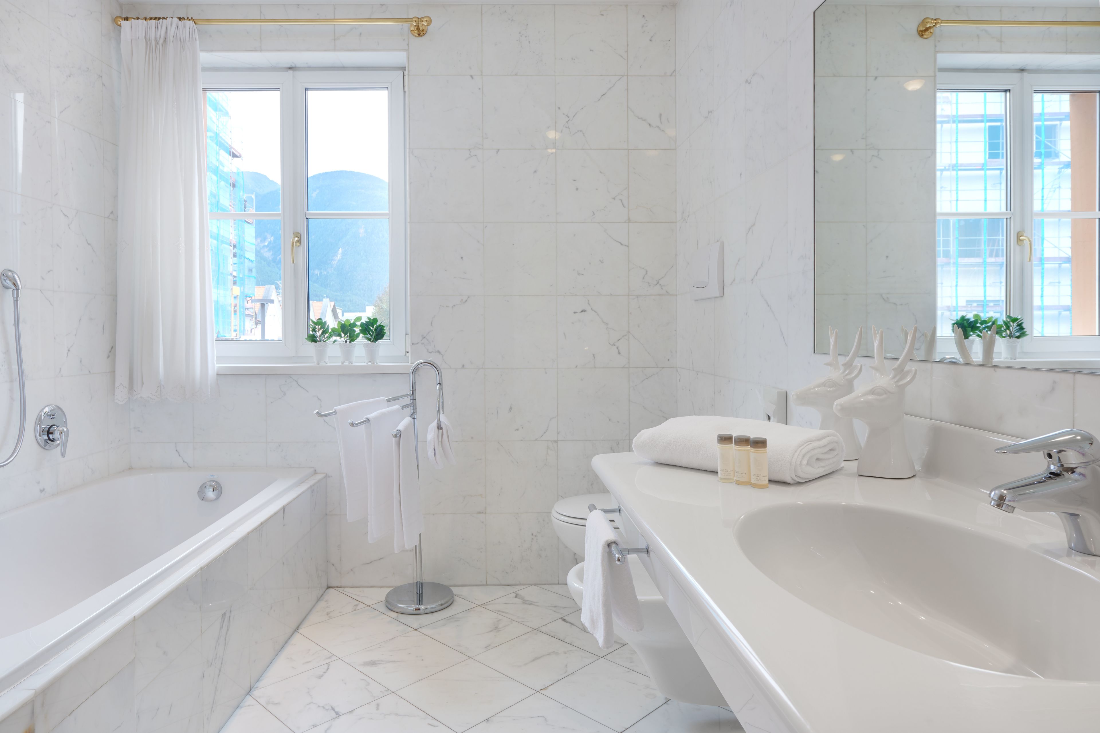 free toiletries, hair dryer, bidet, towels