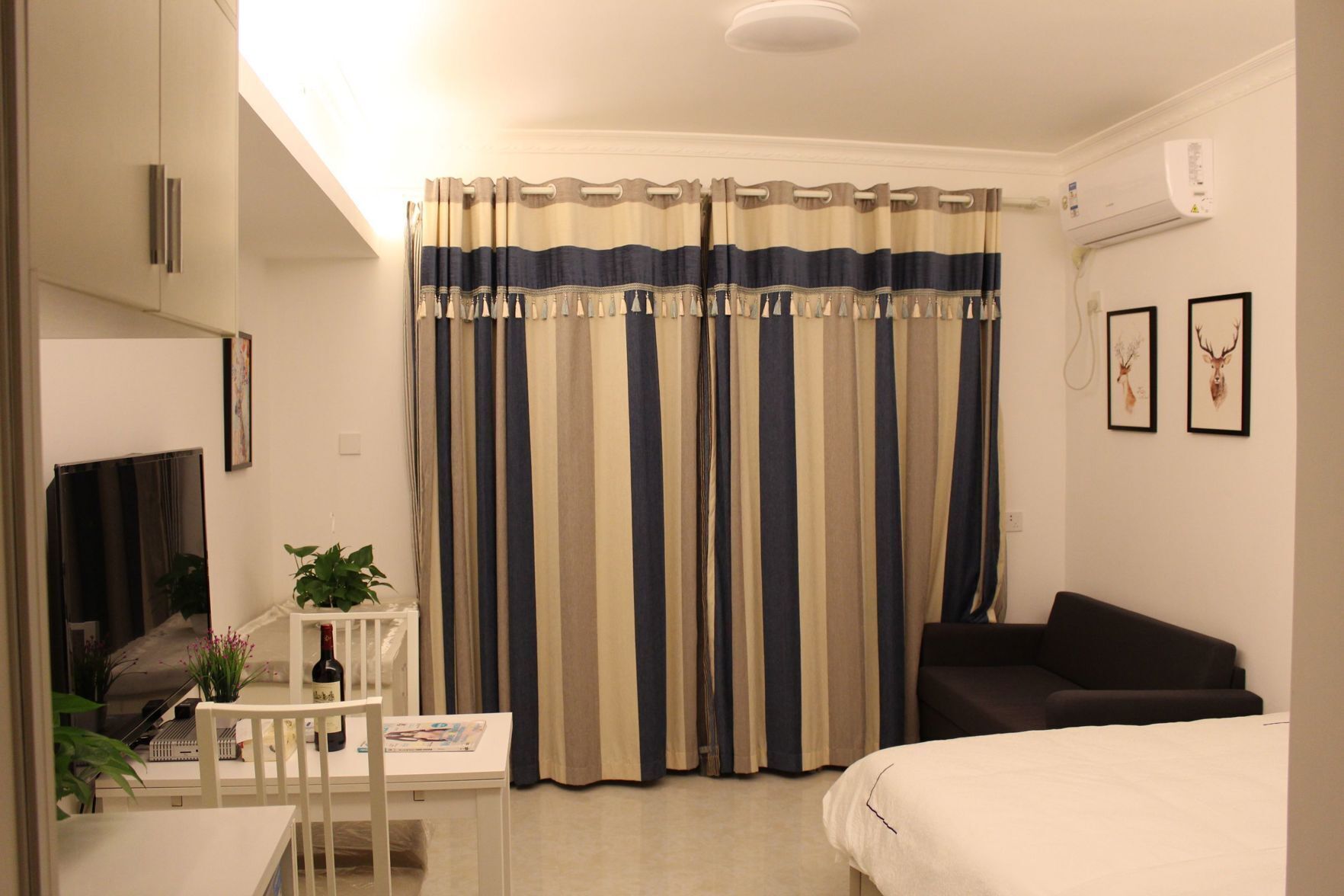 Pillowtop beds, desk, blackout drapes, iron/ironing board