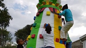 A multi-colored inflatable climbing structure with various colored blocks. - Kivu Resort - Hostel (Nakuru)