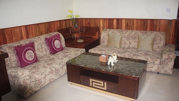 Monorom Suite | Living area | Flat-screen TV