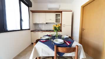 Villa, 2 Bedrooms | Private kitchen | Full-sized fridge, stovetop, coffee/tea maker, electric kettle