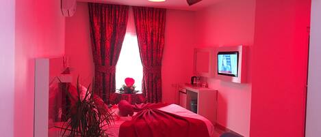 Honeymoon Room | Premium bedding, in-room safe, desk, soundproofing