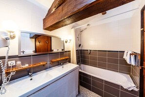 Suite | Bathroom | Deep-soaking bathtub, free toiletries, hair dryer, towels