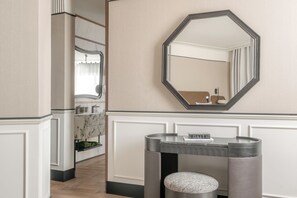 A bathroom with a vanity, a mirror, and a towel rack. - BLESS Barcelona - Preferred Hotels & Resorts, Legend Collection (Barcelona)