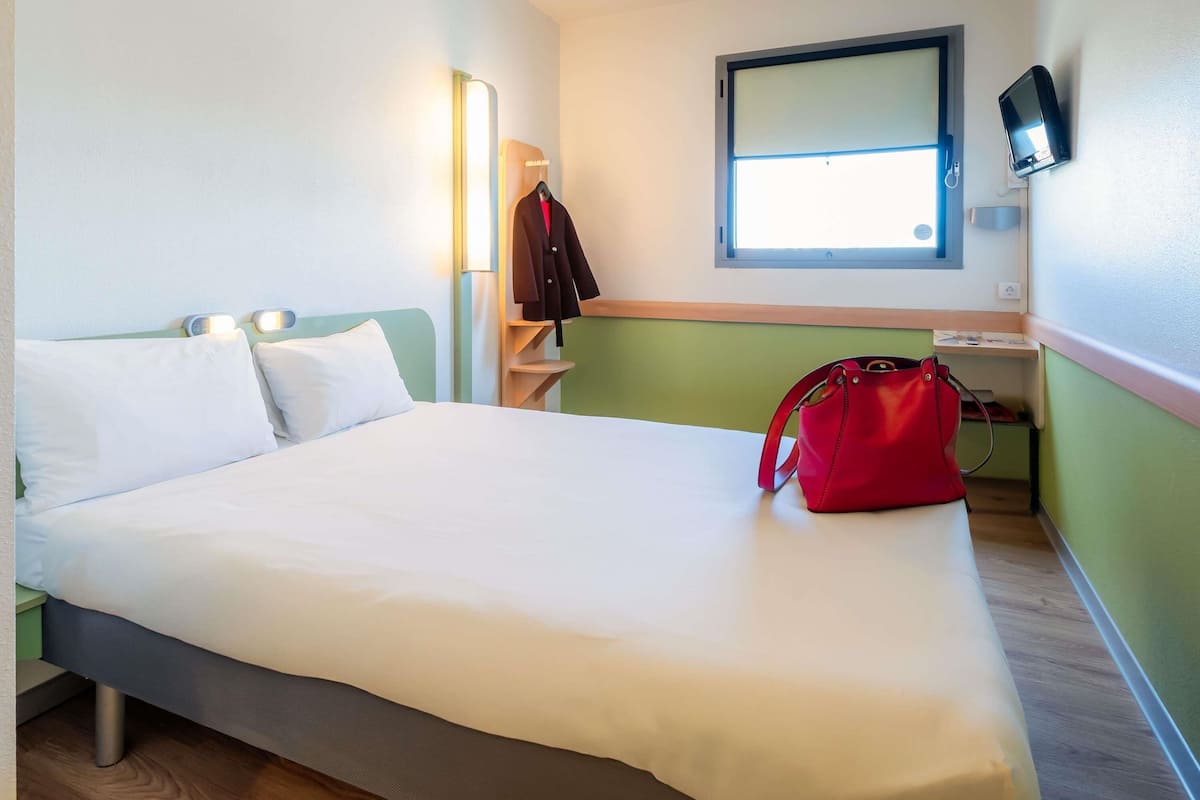 Chambre, 1 lit double | Rideaux occultants, chambres insonorisées