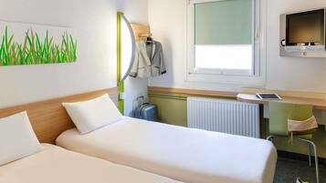 Desk, laptop workspace, blackout drapes, soundproofing