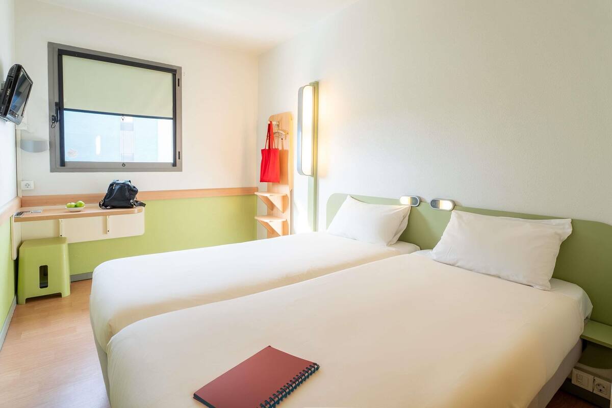 Chambre avec lits jumeaux, 2 lits une place | Rideaux occultants, chambres insonorisées