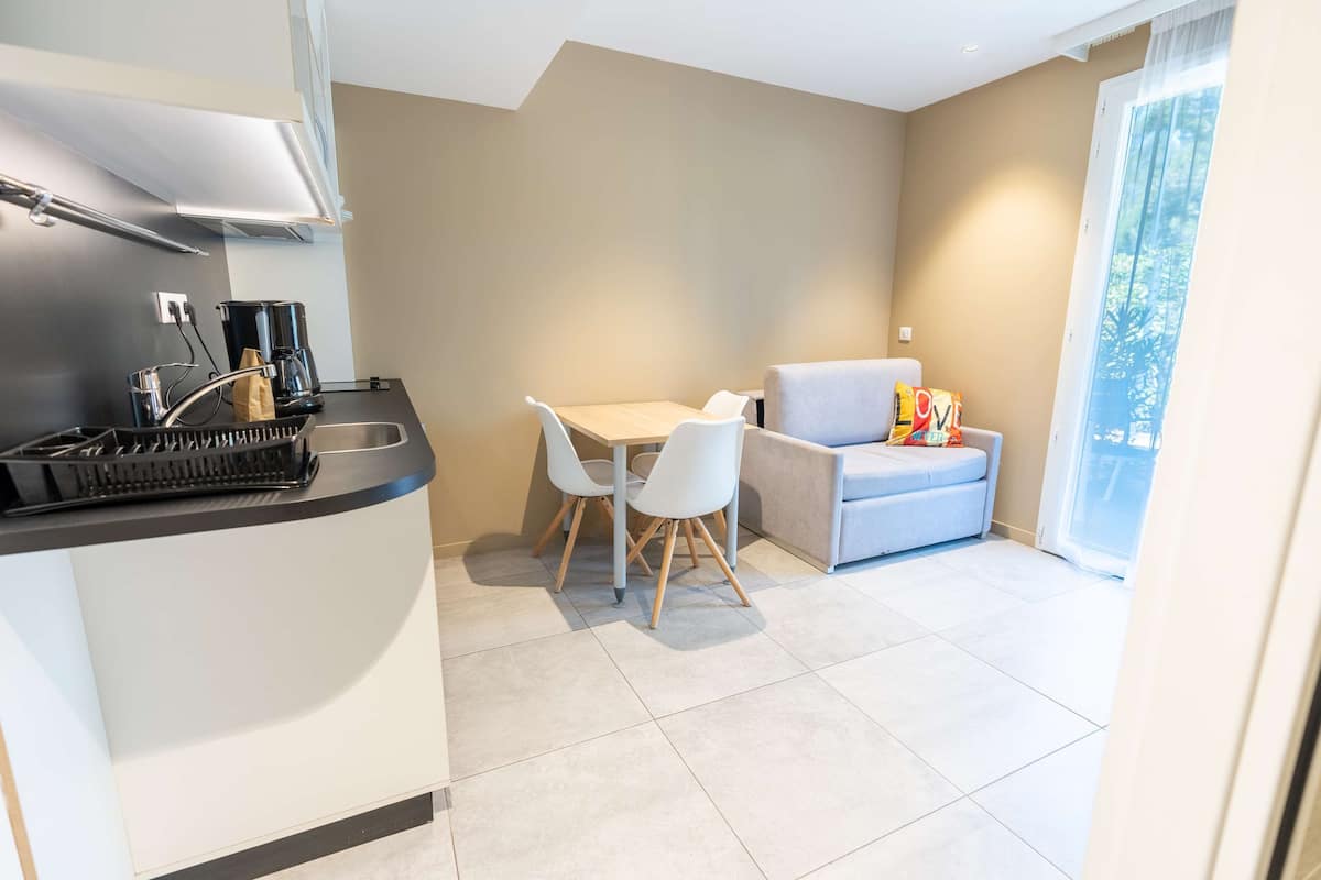 executive studio, multiple beds (one double bed one sofa bed) | in-room safe, laptop workspace, blackout curtains, soundproofing