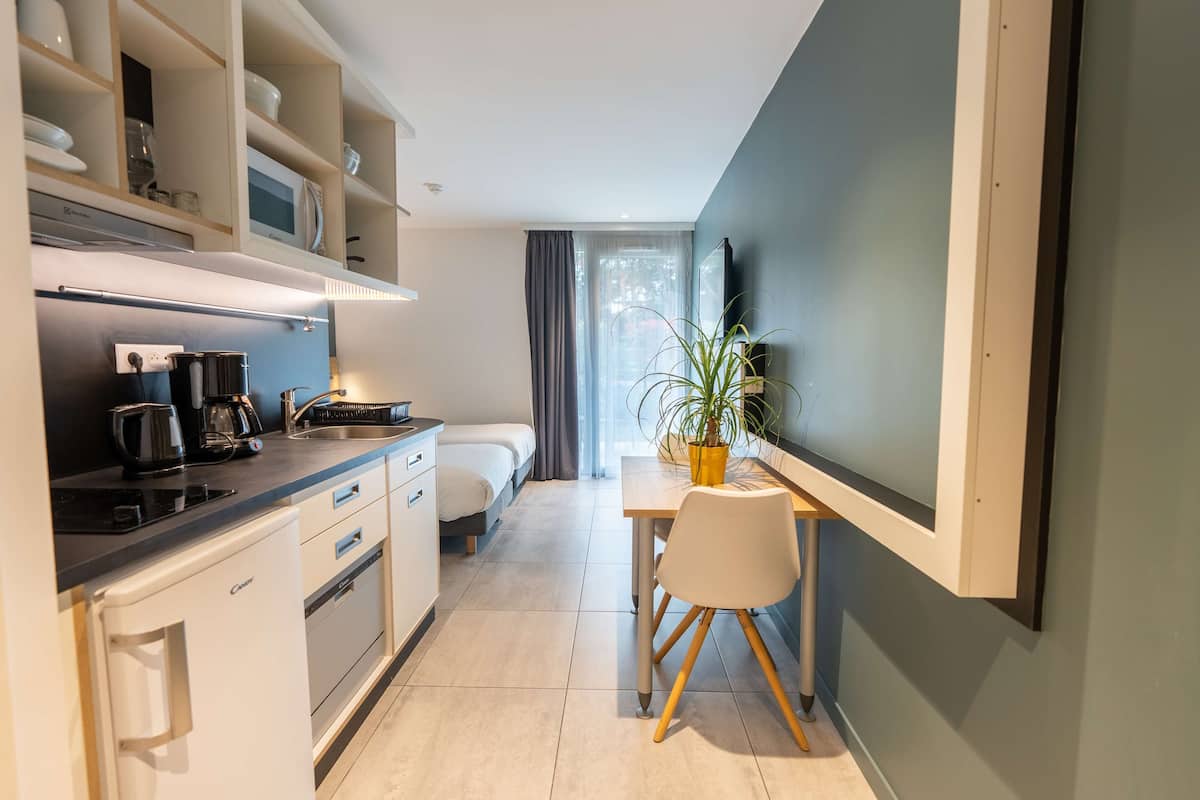 superior studio, 2 single beds (two single beds) | in-room safe, laptop workspace, blackout curtains, soundproofing