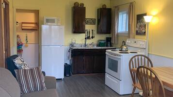 Family Cottage, 2 Bedrooms, Courtyard View | Private kitchen | Full-size fridge, microwave, oven, coffee/tea maker
