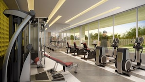 A modern gym with treadmills, stationary bikes, and weight machines. - VN Turiassu Studio 805 (São Paulo)