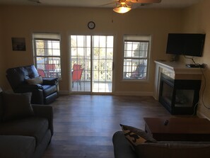 Flat-screen TV, video games, DVD player, foosball